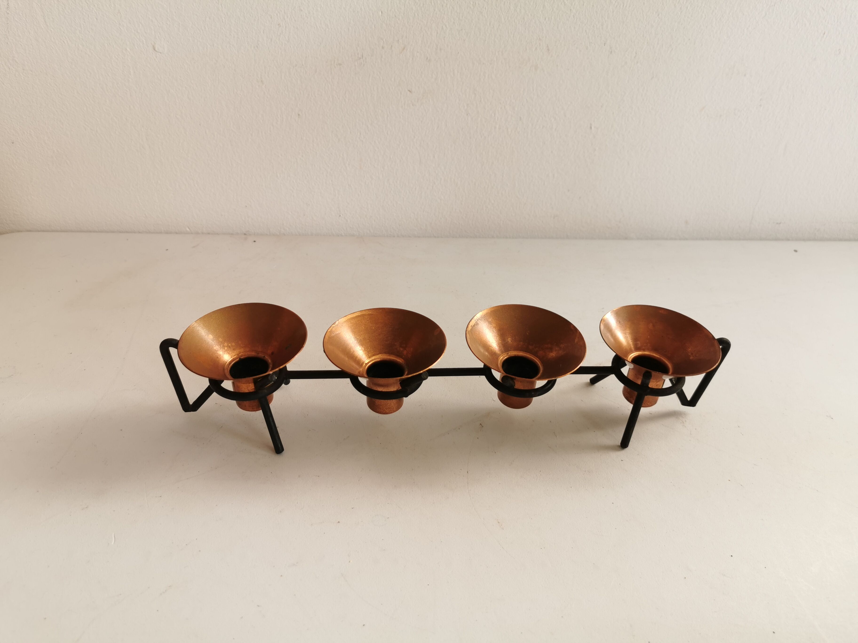 Older Danish designed candlestick, made of cast iron and copper.