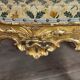 Remarkable small armchair in carved and gilded wood, Venice, early 18th century