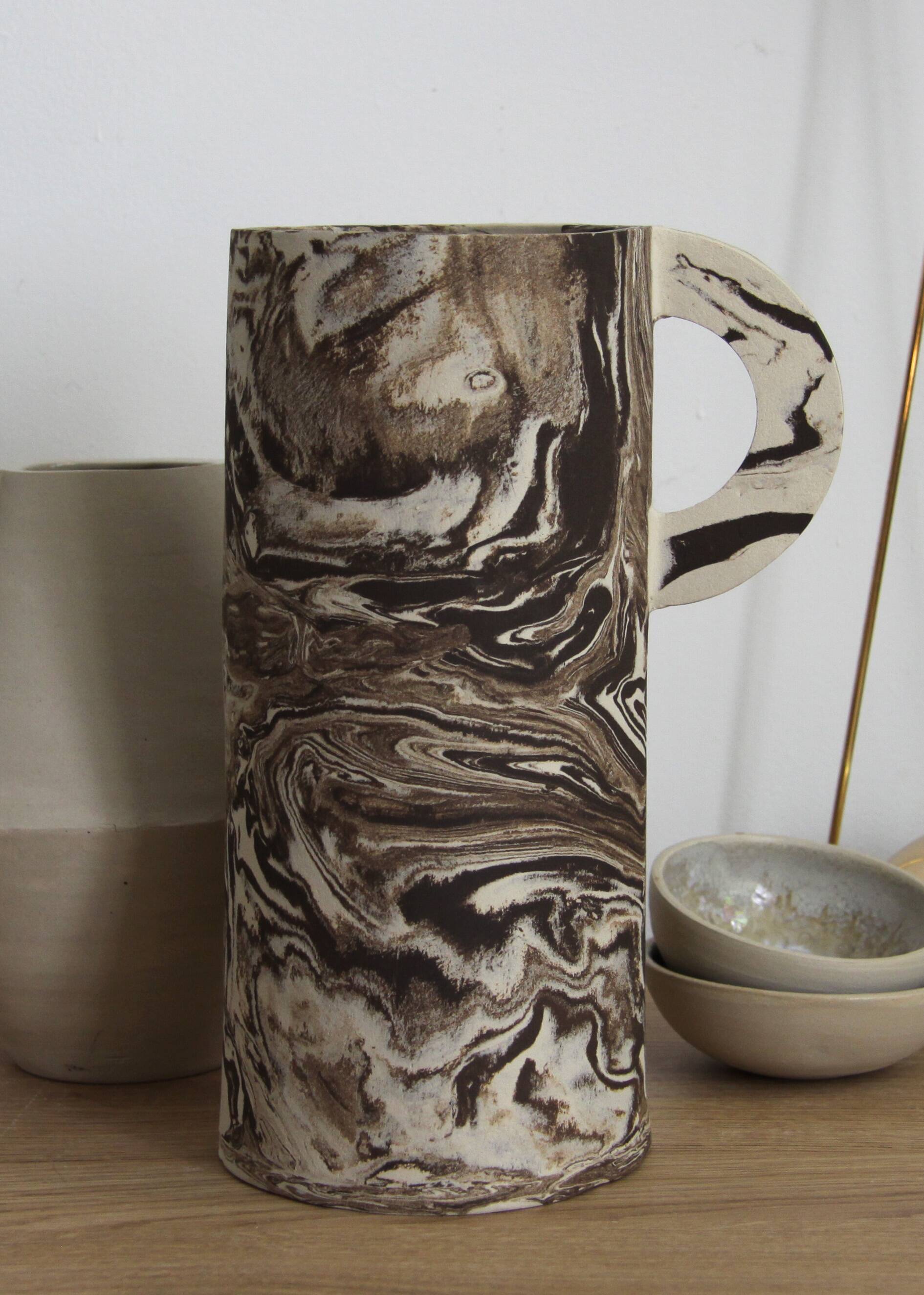 Magnificent mixed clay vase