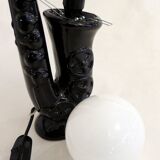 1980' Saxophone lamp in black earthenware & opaline globe