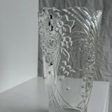 Glass vase with stylized flower pattern