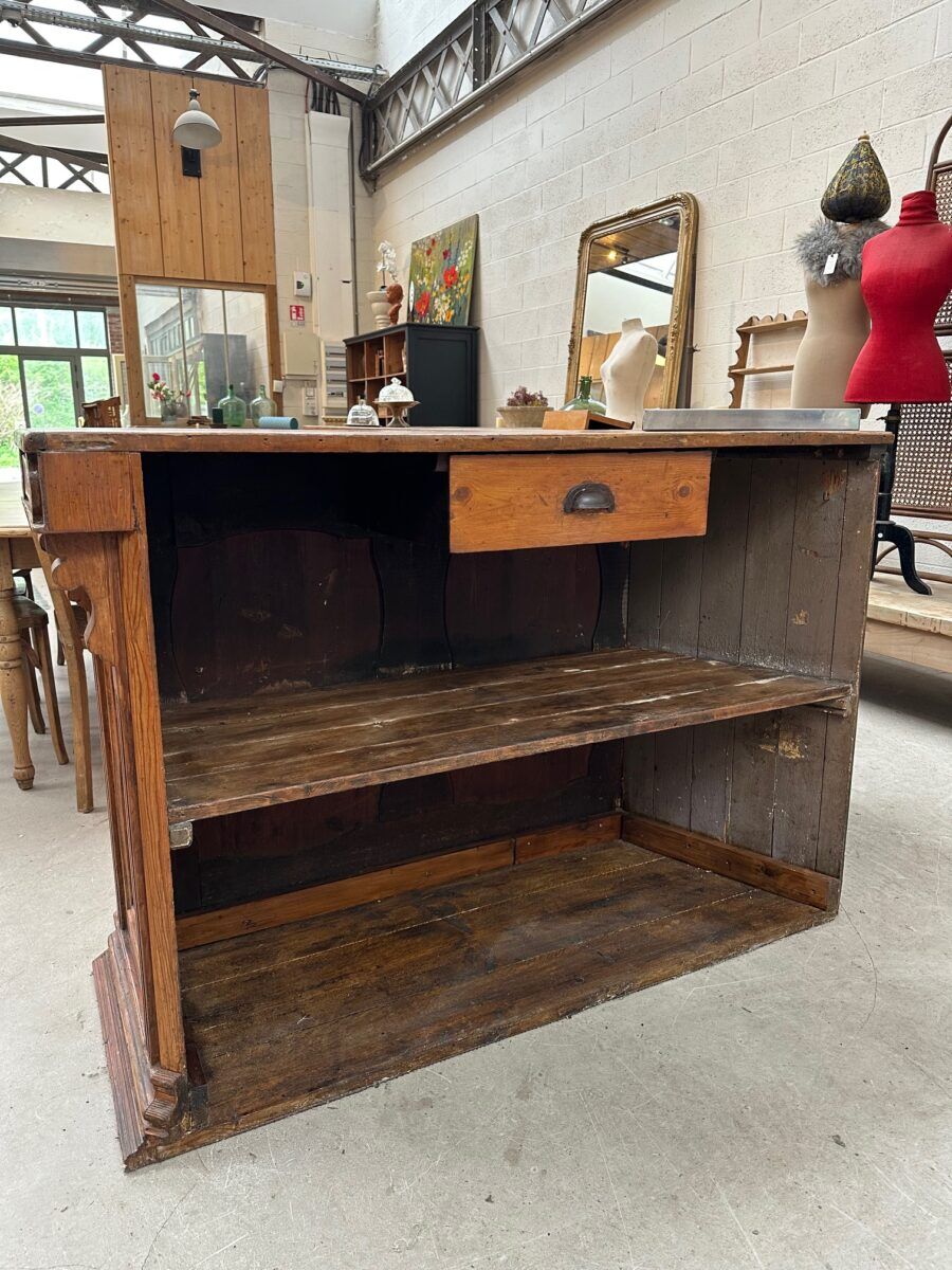 Large corner bar counter from the late 19th century.