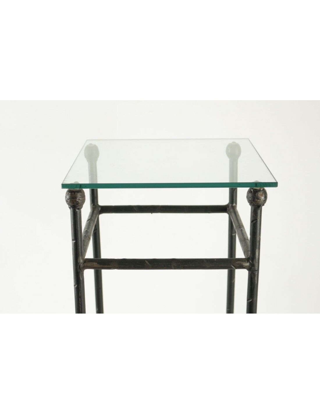 Two consoles, wrought iron sheaths on glass top, twentieth century