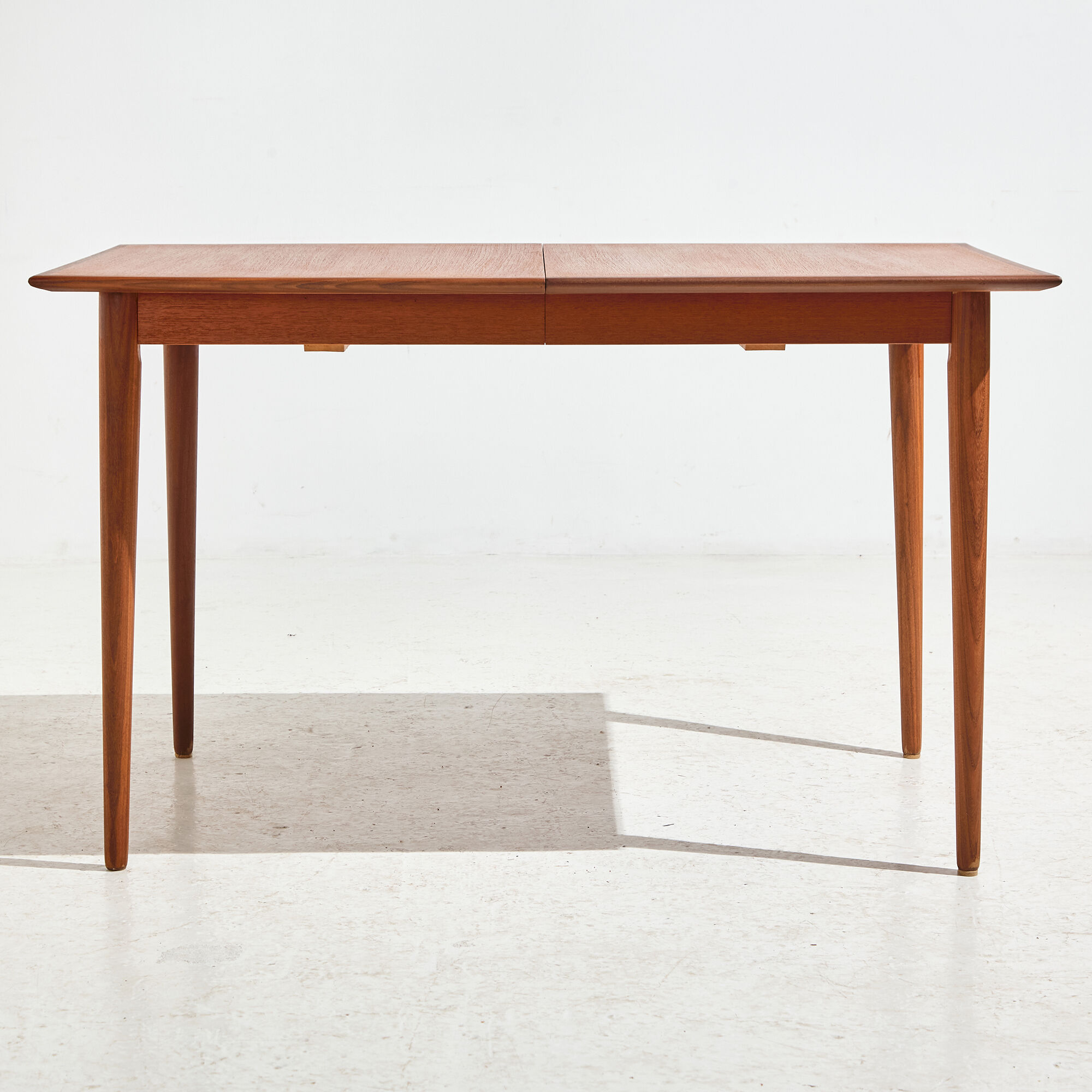 Restored teak dining table