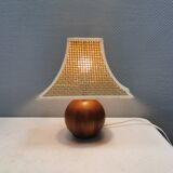 Very rare table lamp in turned teak wood with original braided shade. 1970s