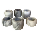 Six marble candlesticks