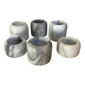 Six marble candlesticks