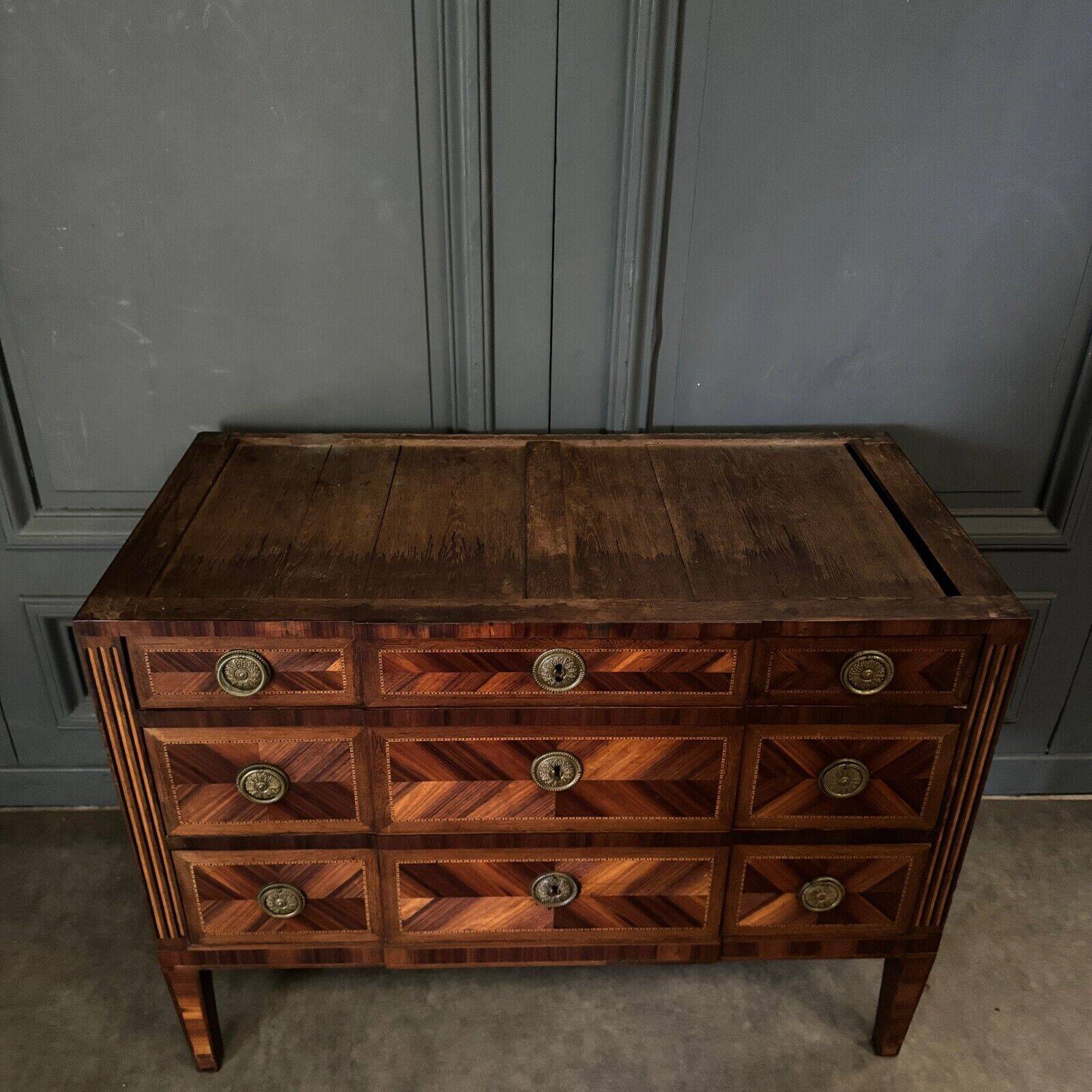 Louis XVI period chest of drawers in 18th century marquetry