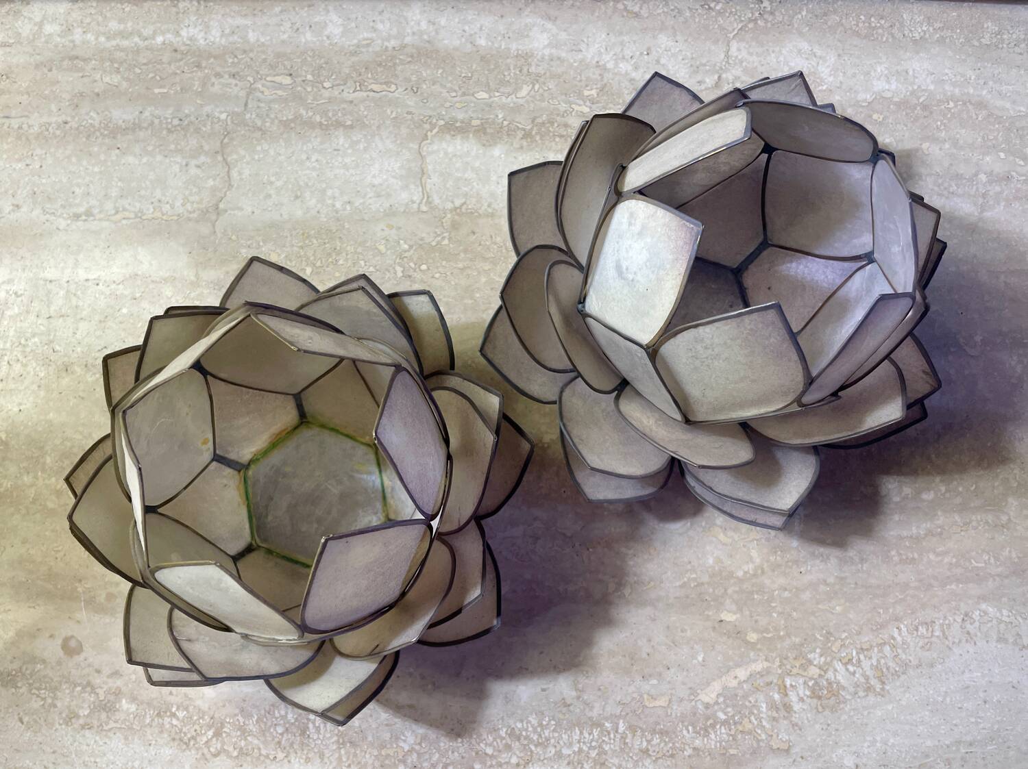 Mother-of-pearl and brass candlesticks