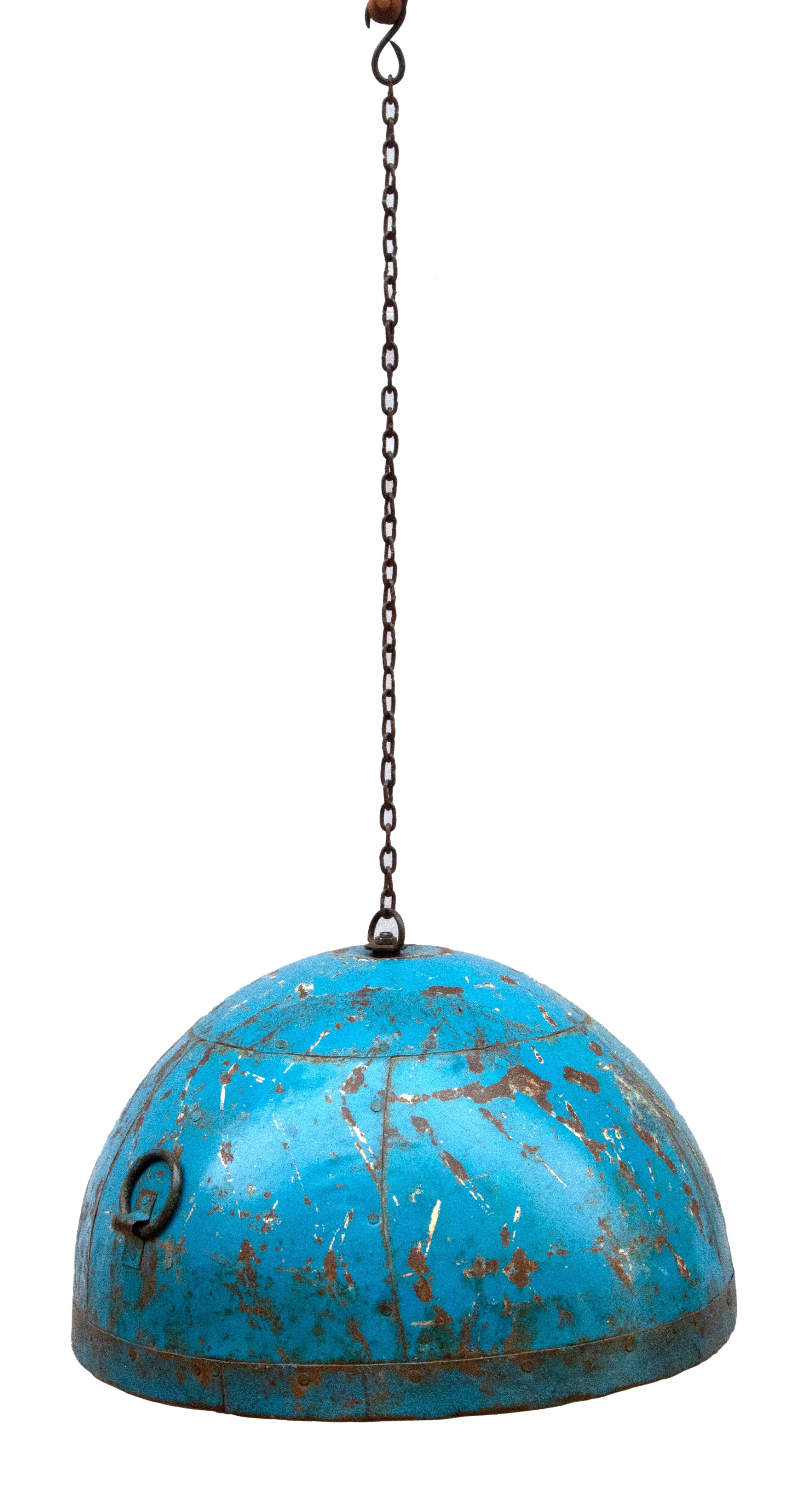 Metal hanging with its original blue colour
