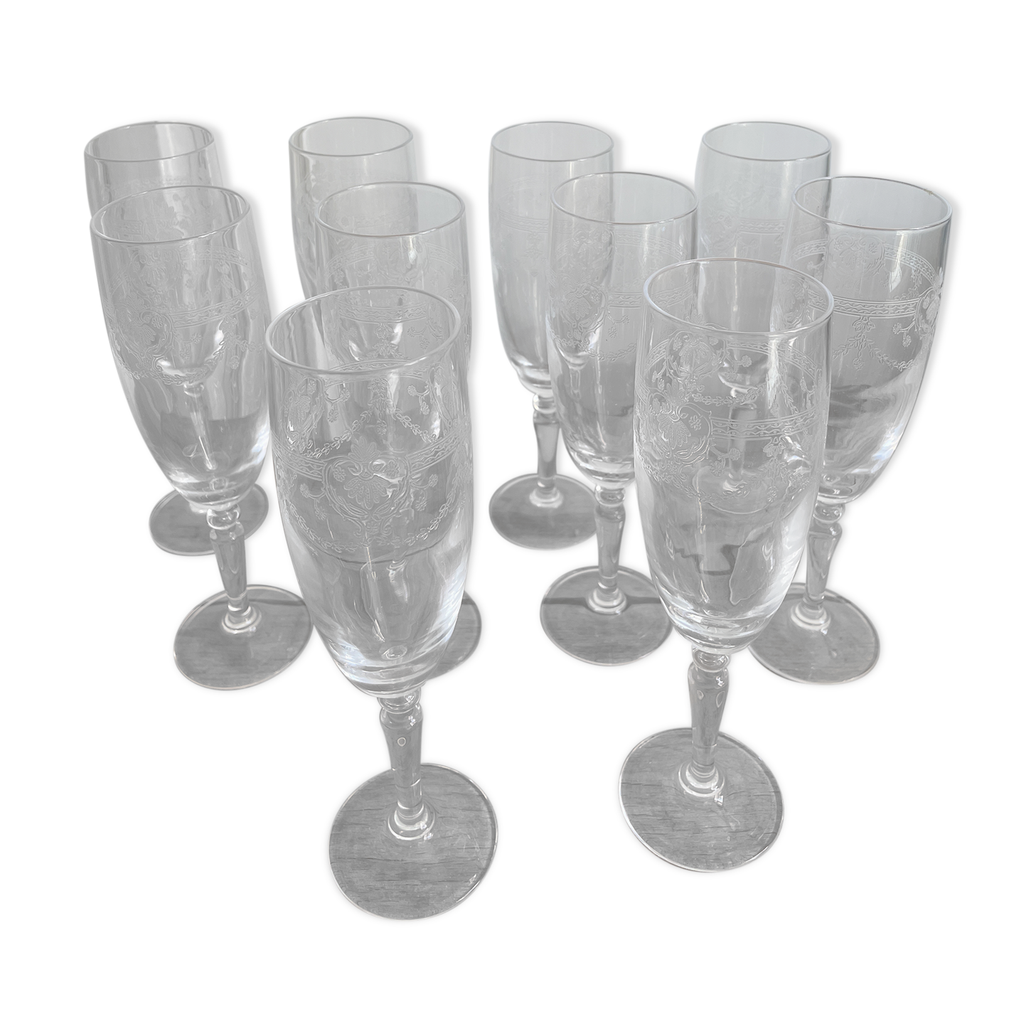 Set of 10 antique champagne glasses in engraved crystal