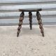 Turned wooden tripod stool