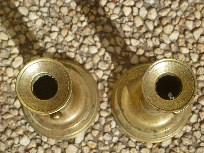 Pair of candlesticks a push brass