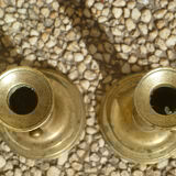 Pair of candlesticks a push brass