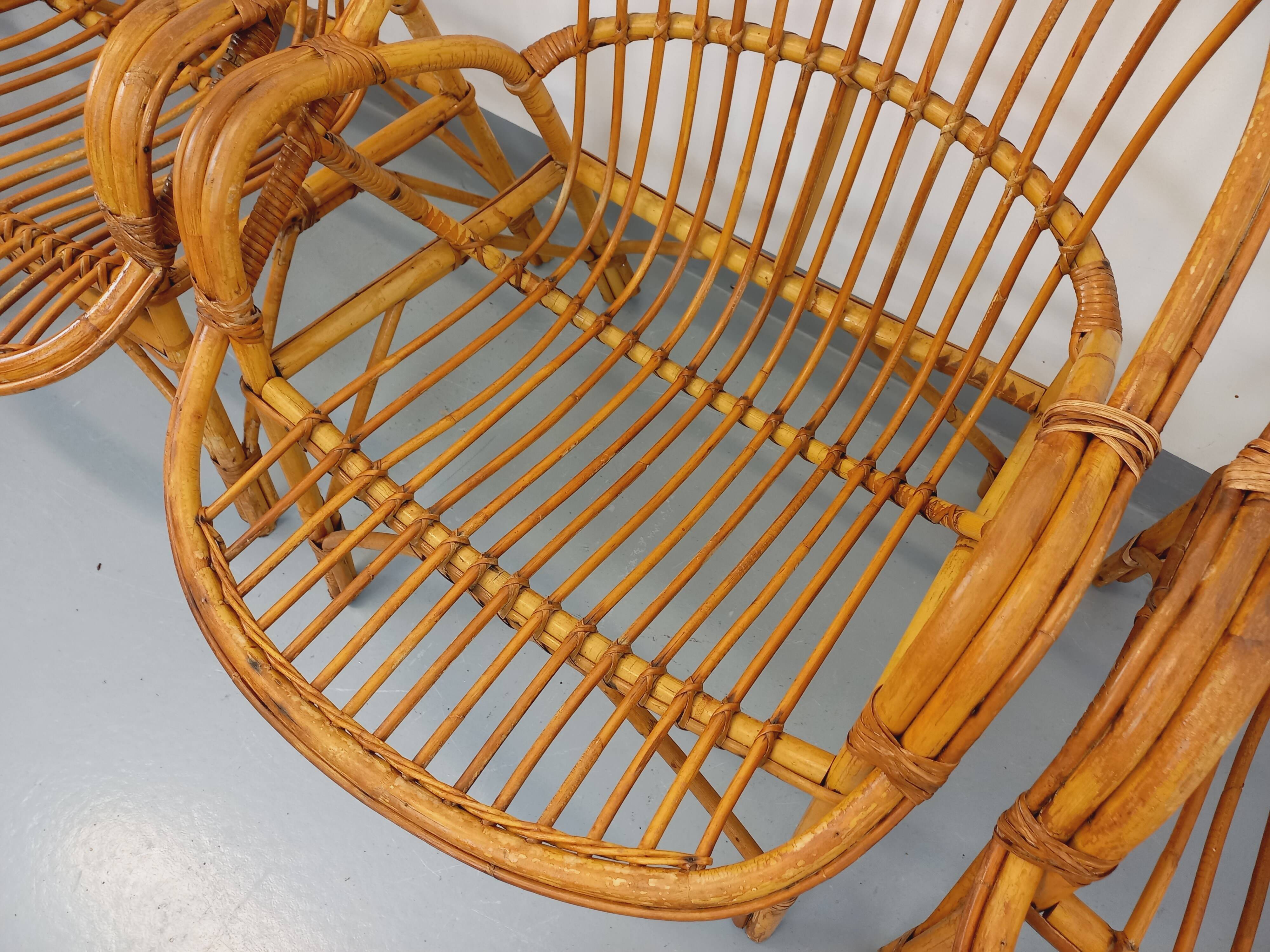 Set of 4 vintage rattan armchairs from the 60s