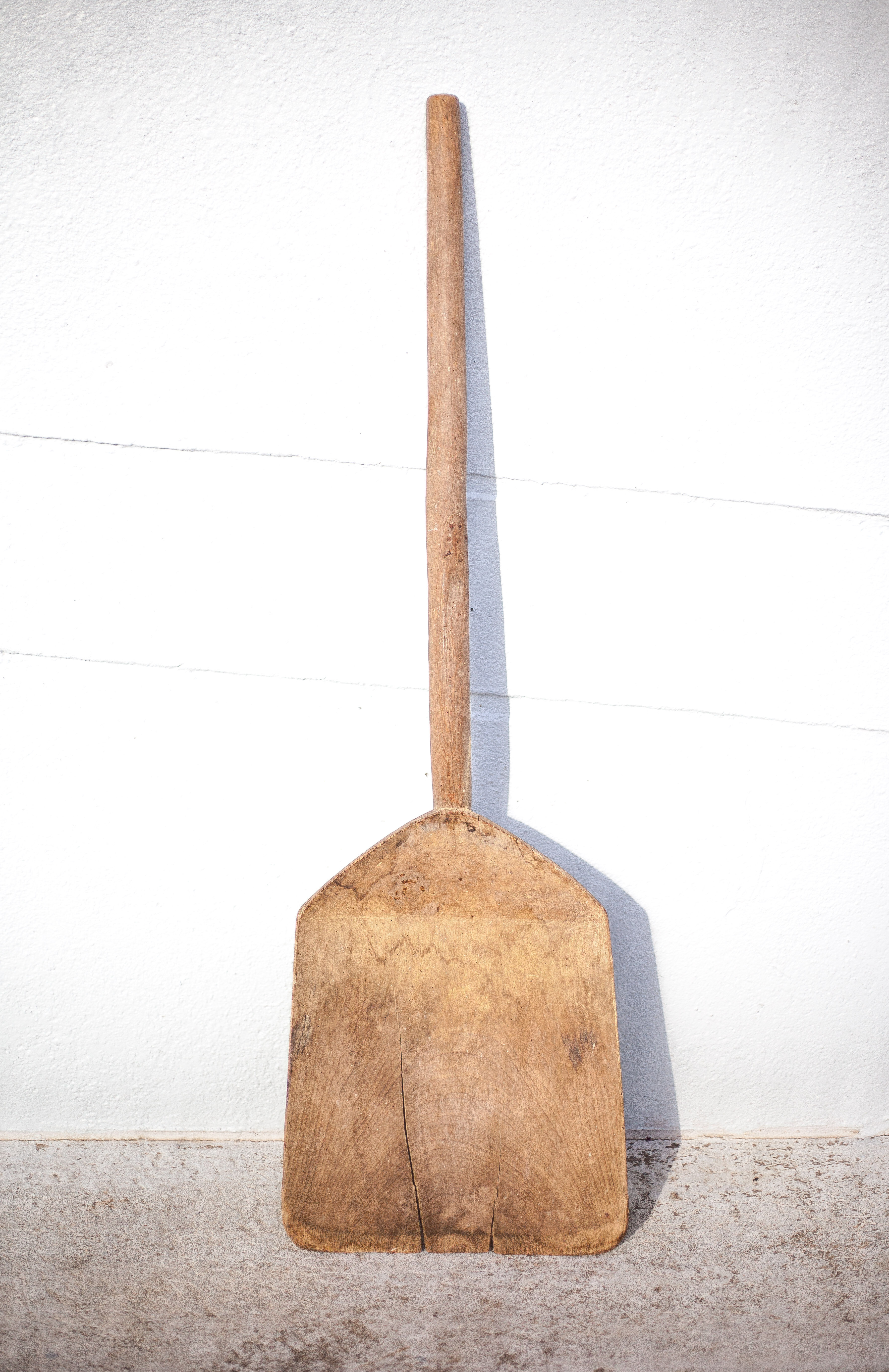 Old wood grain shovel, large wooden shovel, rustic, countryside, decoration