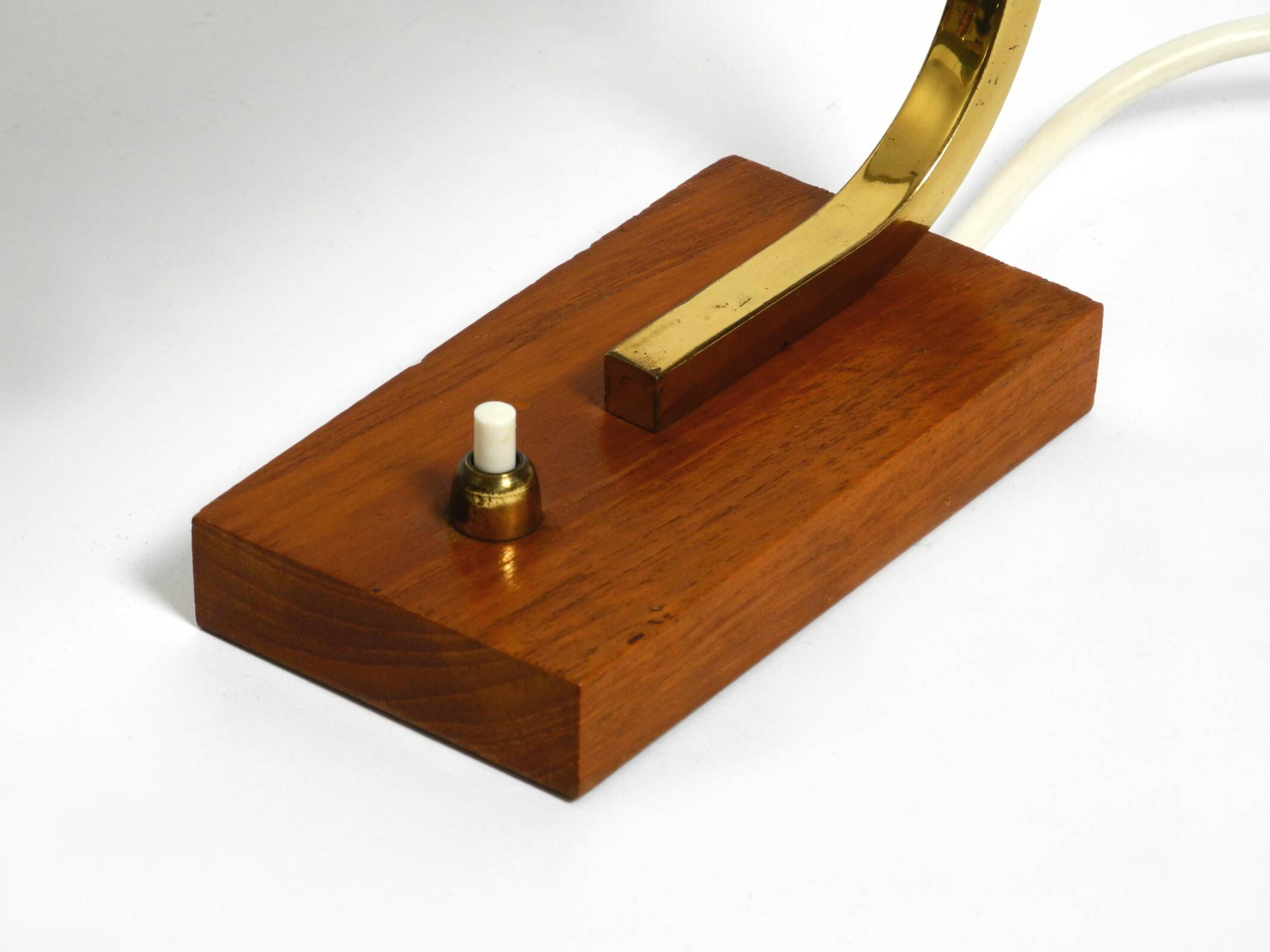 Beautiful small Mid Century Modern metal and brass table lamp with teak bas