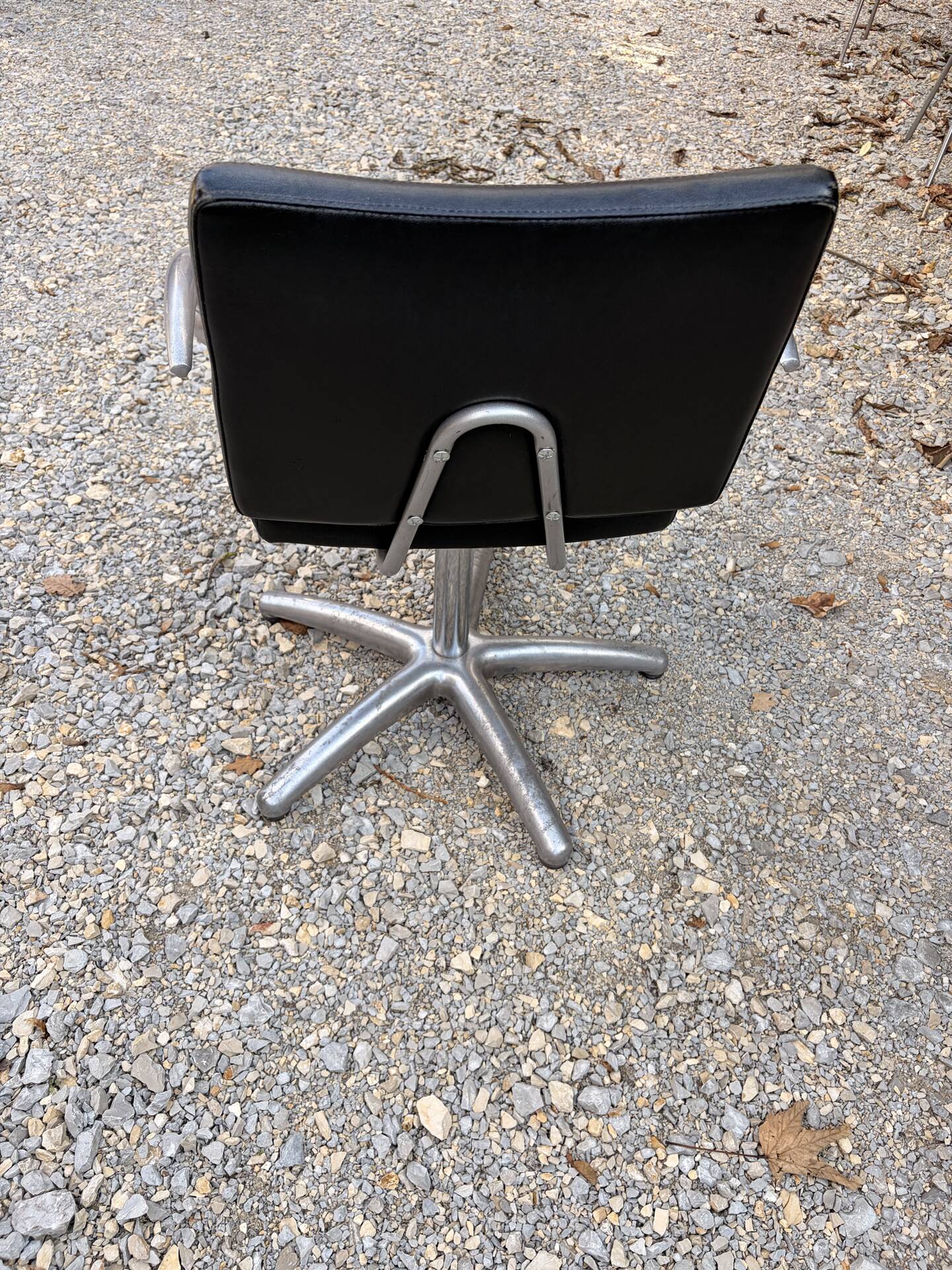 Futuristic 90s style hairdresser's chair