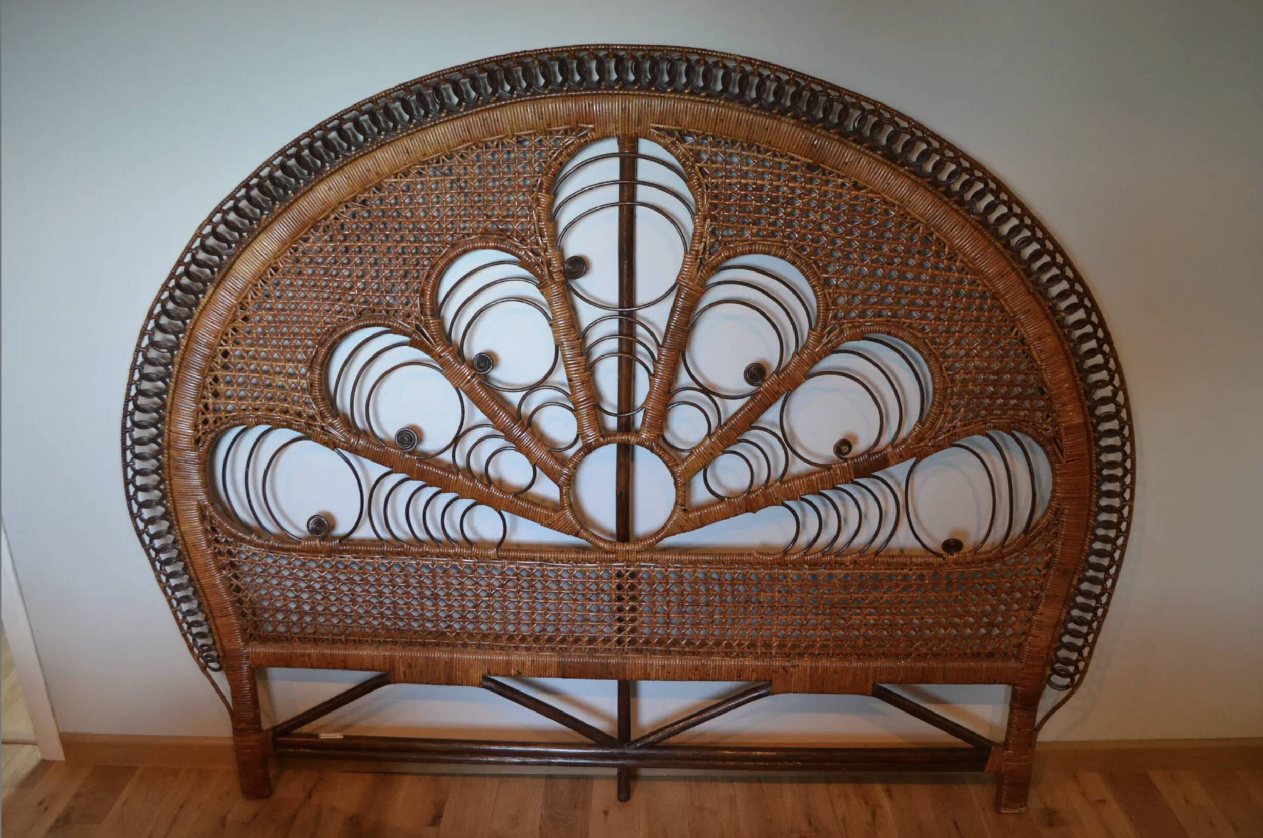 Brown peacock headboard for a 140cm bed.