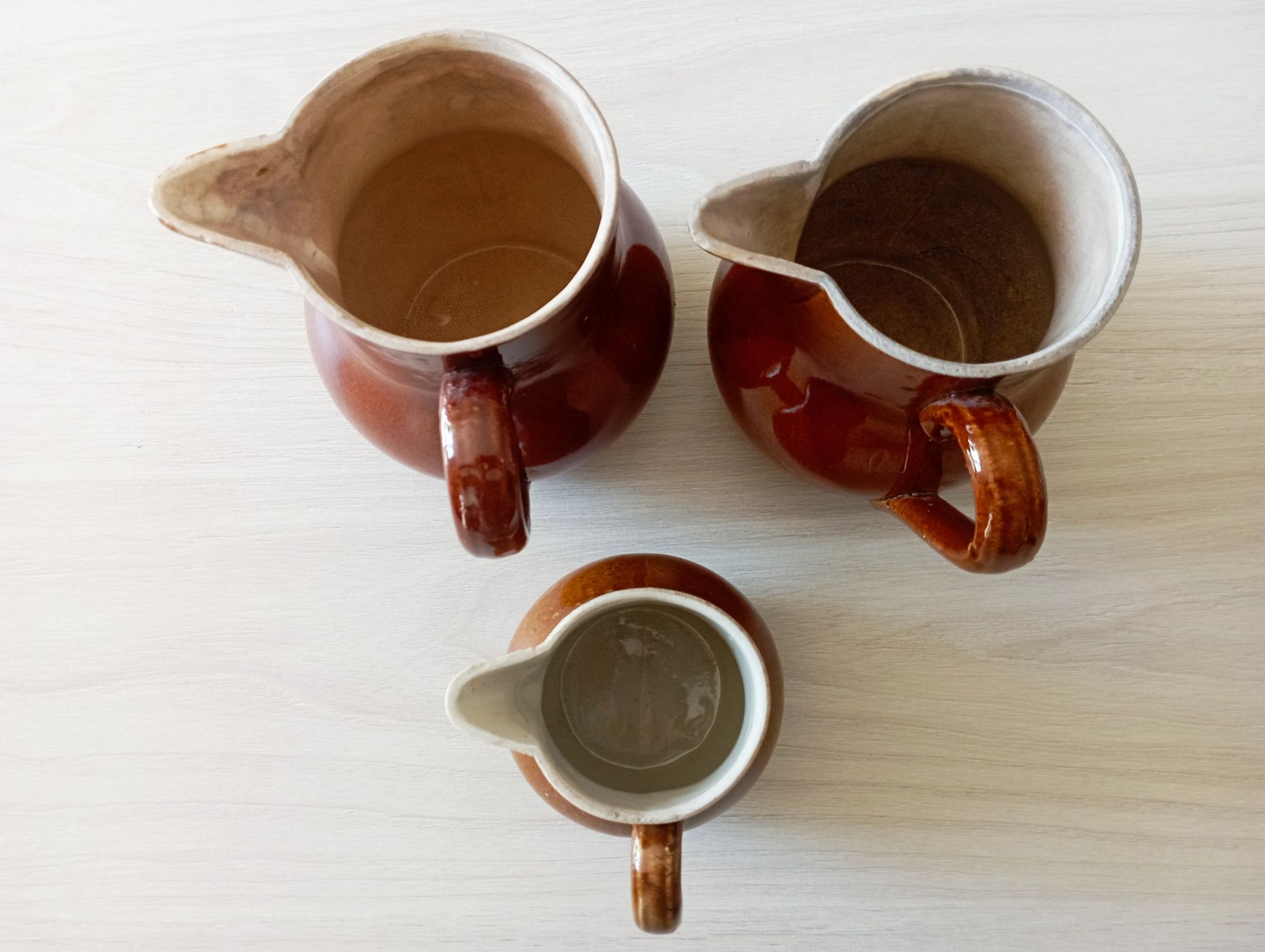 Set of 3 antique pitchers