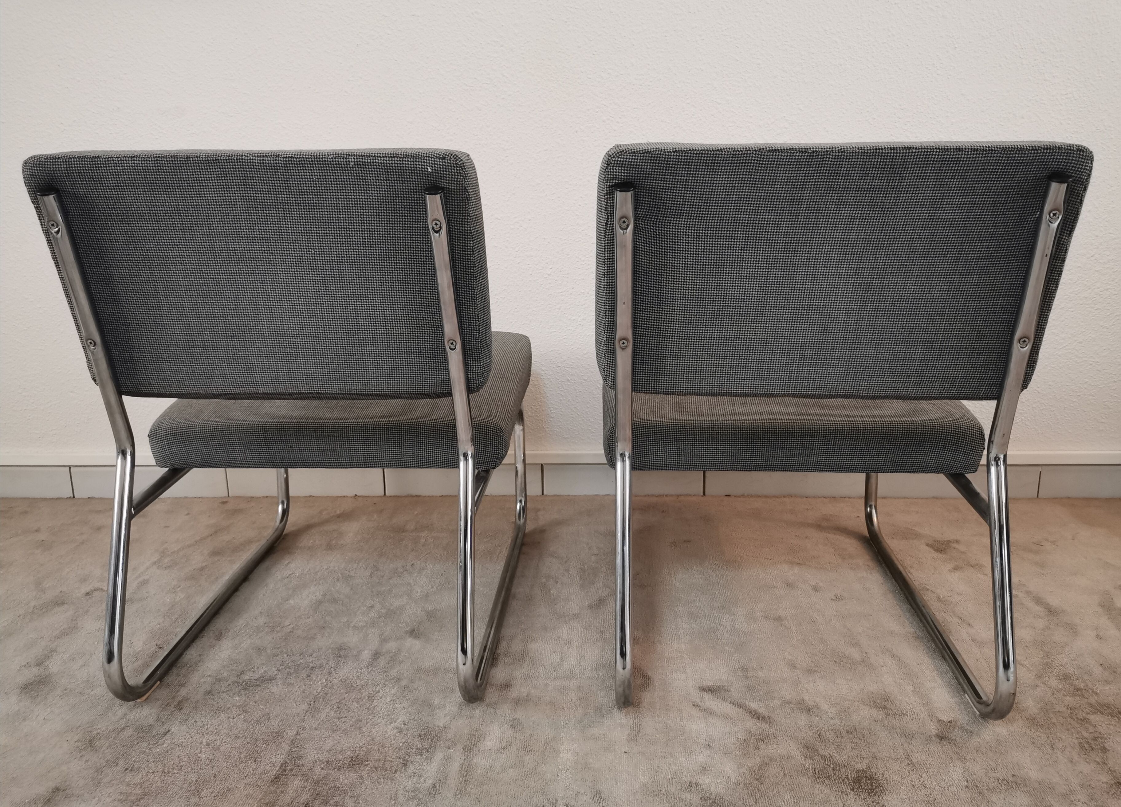 Pair of vintage chrome armchairs and "chicken foot" fabrics