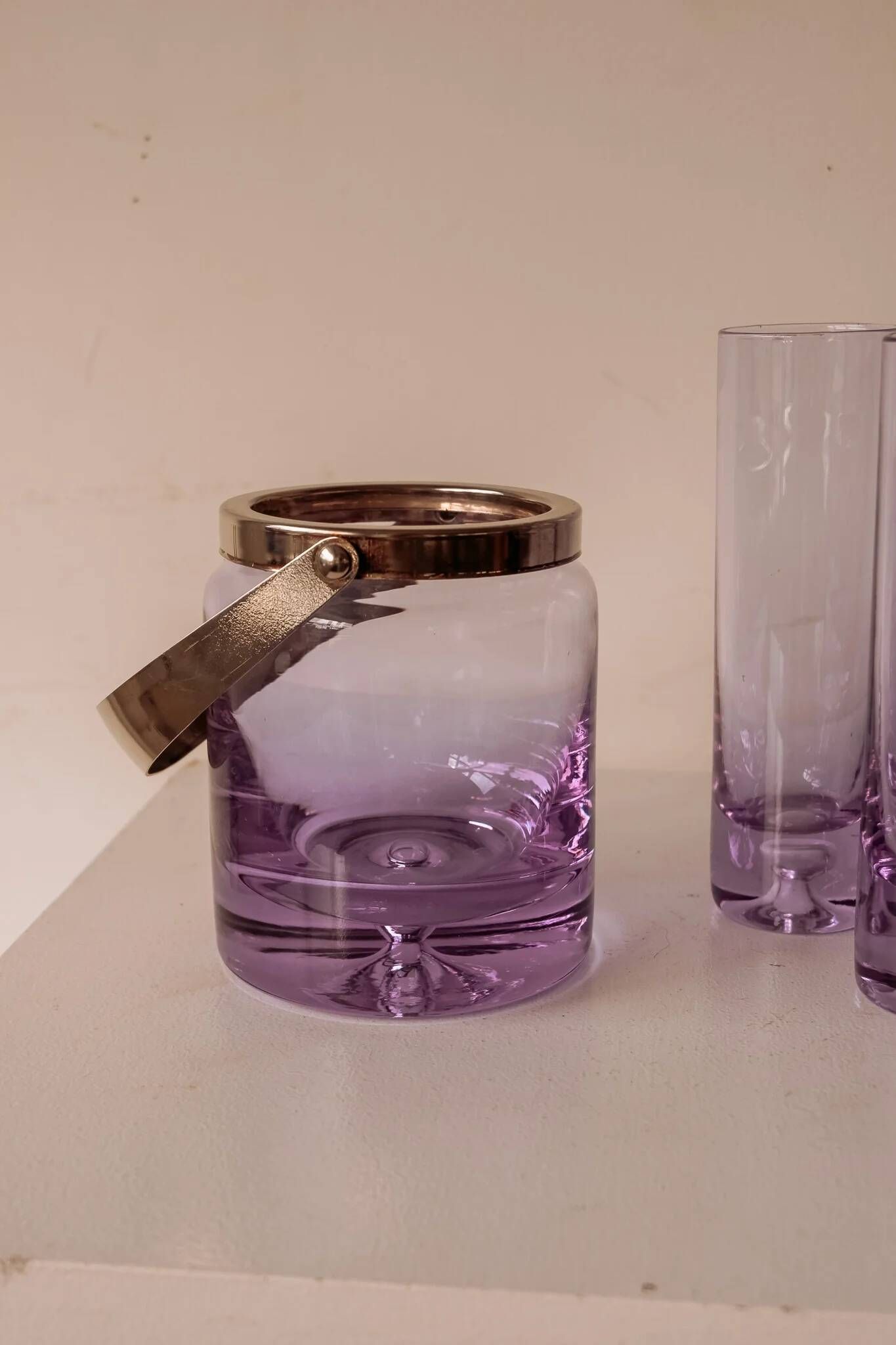 Set of lilac alexandrite liqueur glasses with matching ice bucket.