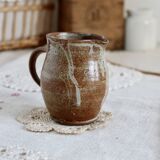 Small vintage hand turned ceramic milk jug with rustic glaze