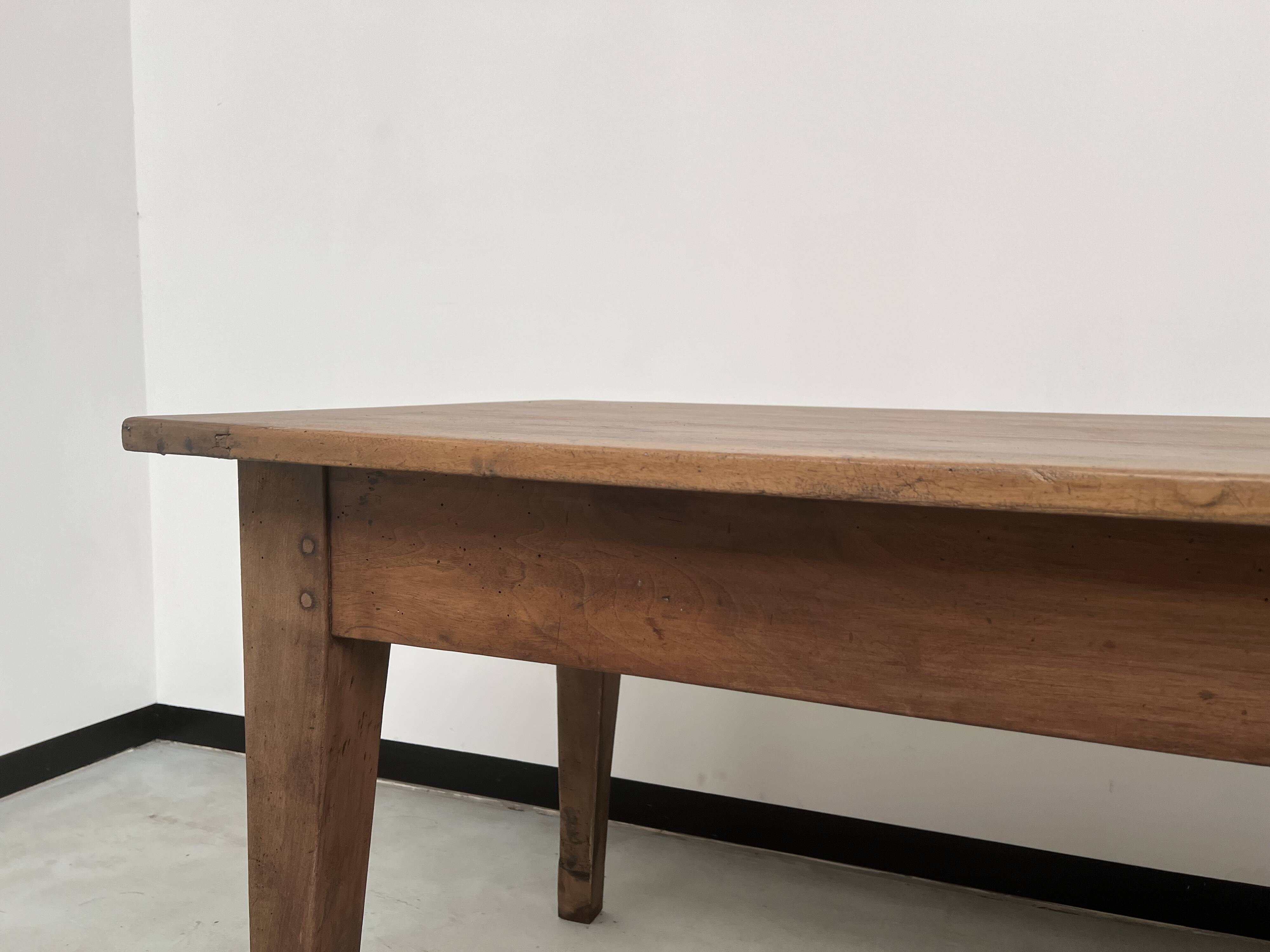 Solid walnut farmhouse table with spindle legs