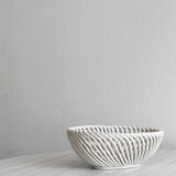 Small white ceramic twisted basket