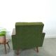 Fauteuil vert avec dossier en bois de teck
