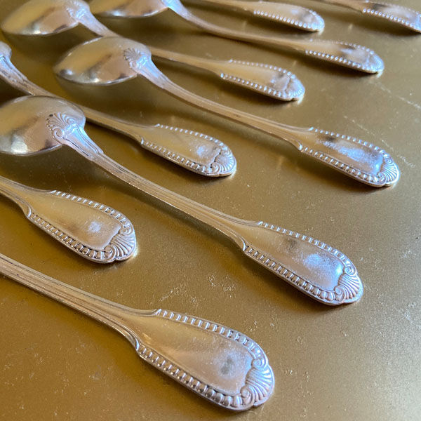 Series of 9 silver metal dessert spoons, Boulenger