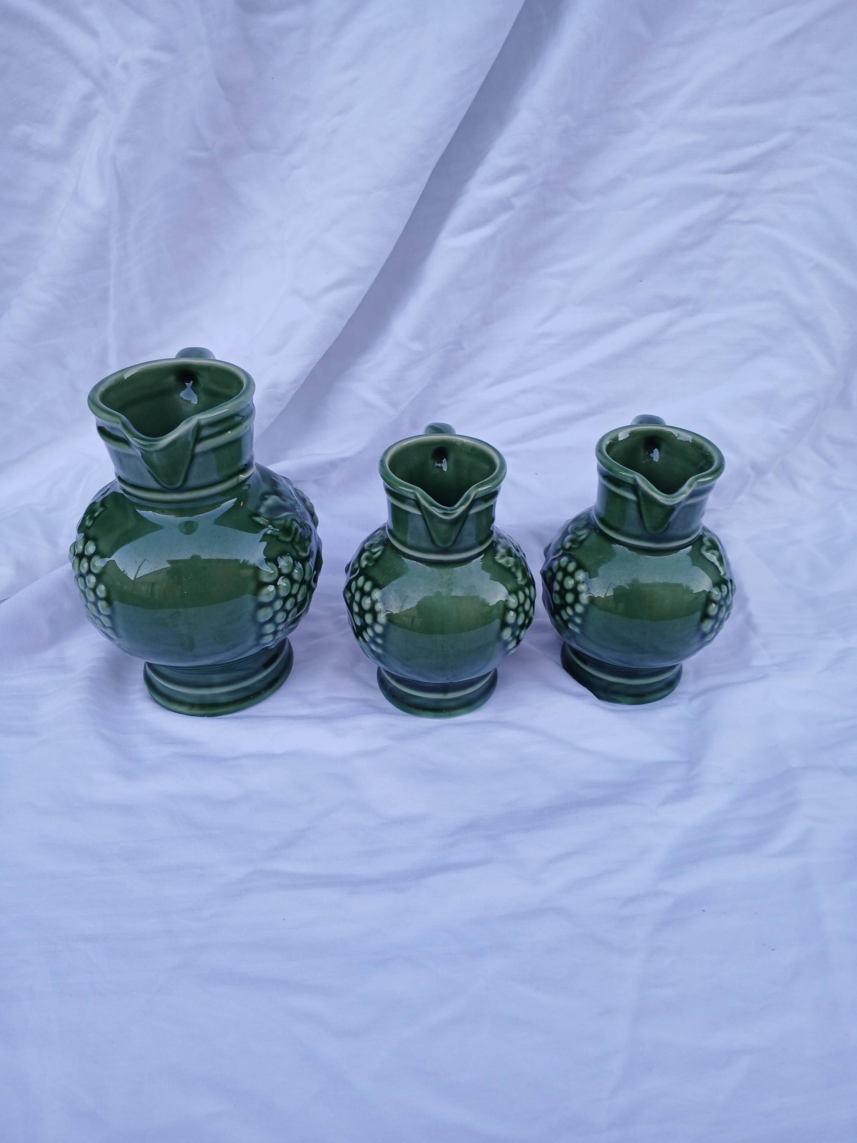 3 antique wine jugs
