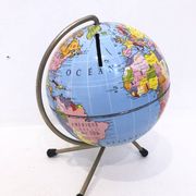 Globe piggy bank, 1950