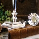 Paire de bougeoirs en métal argenté