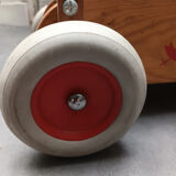 Walking trolley with multicolored wooden cubes