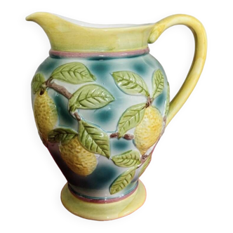 Ceramic pitcher decorated with lemons in relief signed GV 20th century