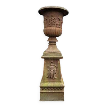 Large old cast iron planter on pedestal