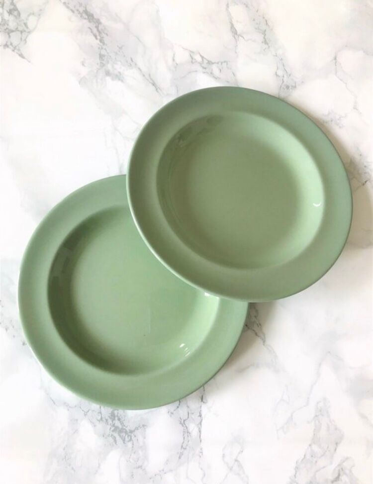 Pair of green almond Wedgwood earthenware cups