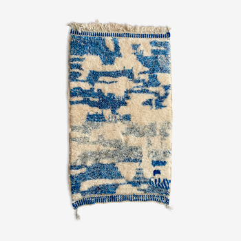 Berber carpet with blue patterns