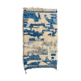 Berber carpet with blue patterns