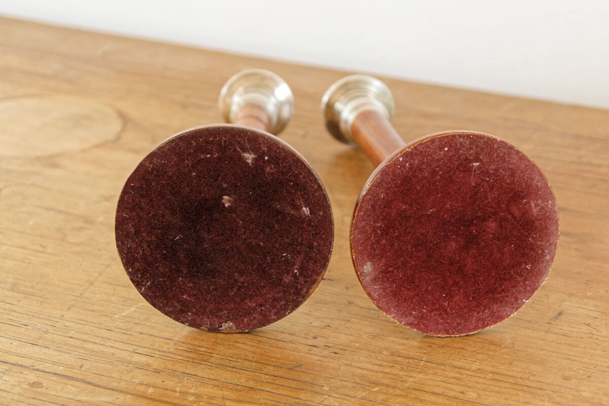 Pair of Indian candle holders, wood and silver metal