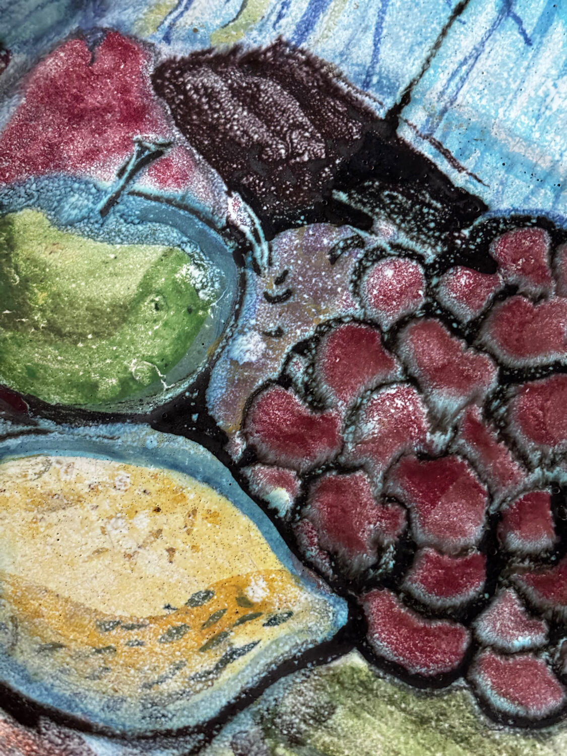 Ceramic bowl with abstract fruit patterns