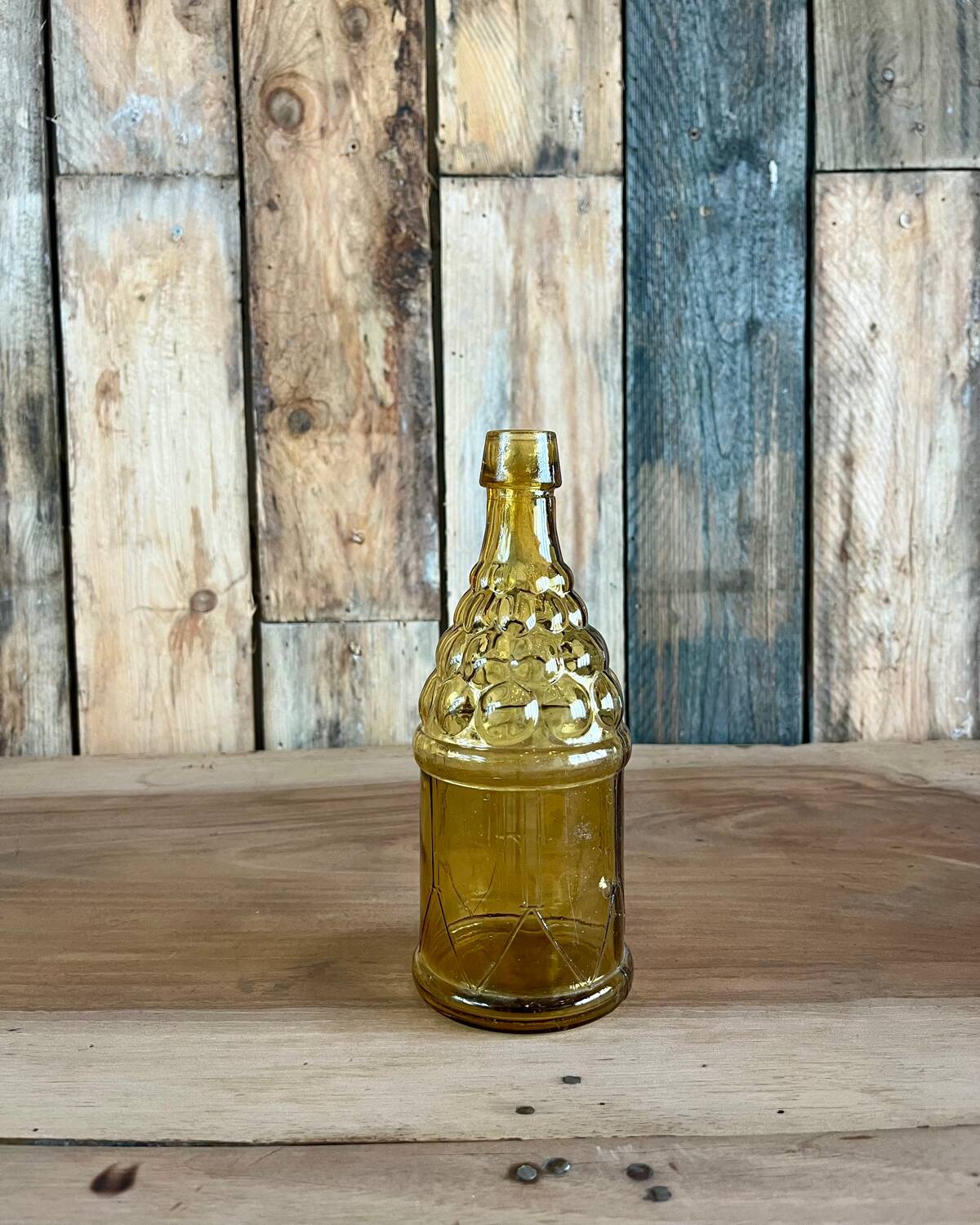 70s yellow glass bottle