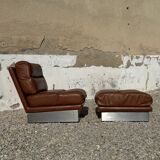 2 armchairs and 1 ottoman in brushed aluminium and brown leather, France, 1970.
