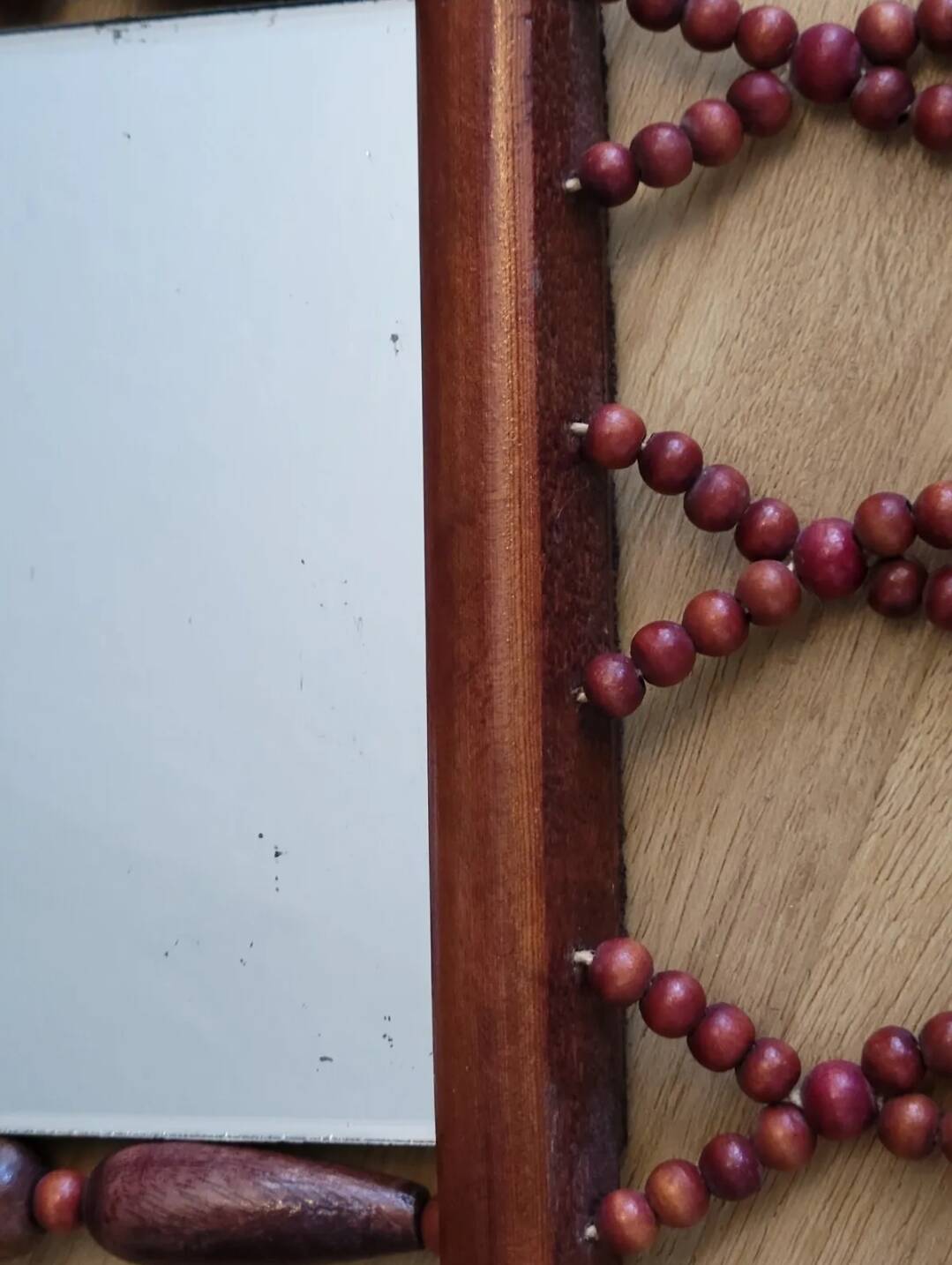 Miroir bohème vintage en perles de bois
