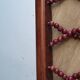 Miroir bohème vintage en perles de bois