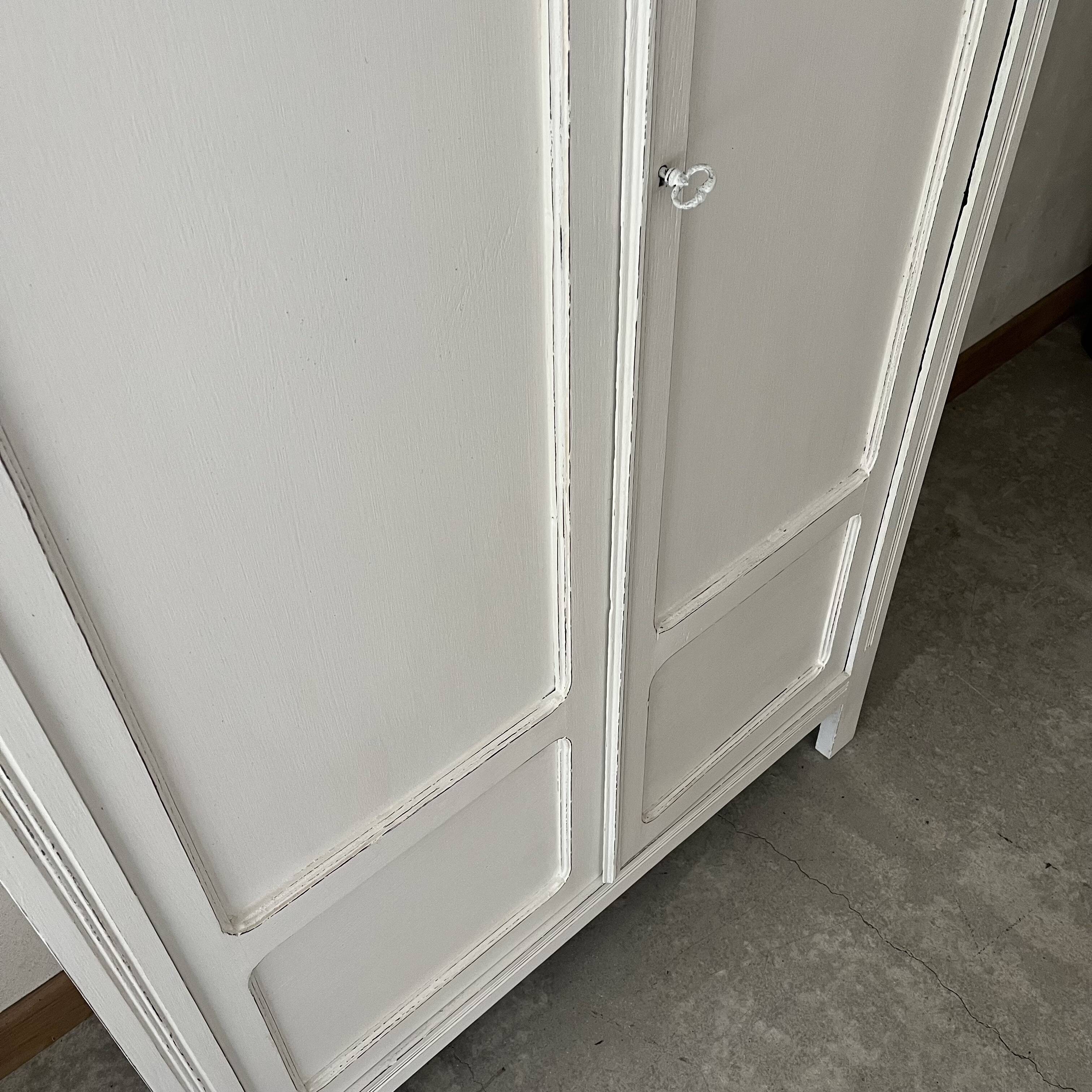 White patinated wardrobe