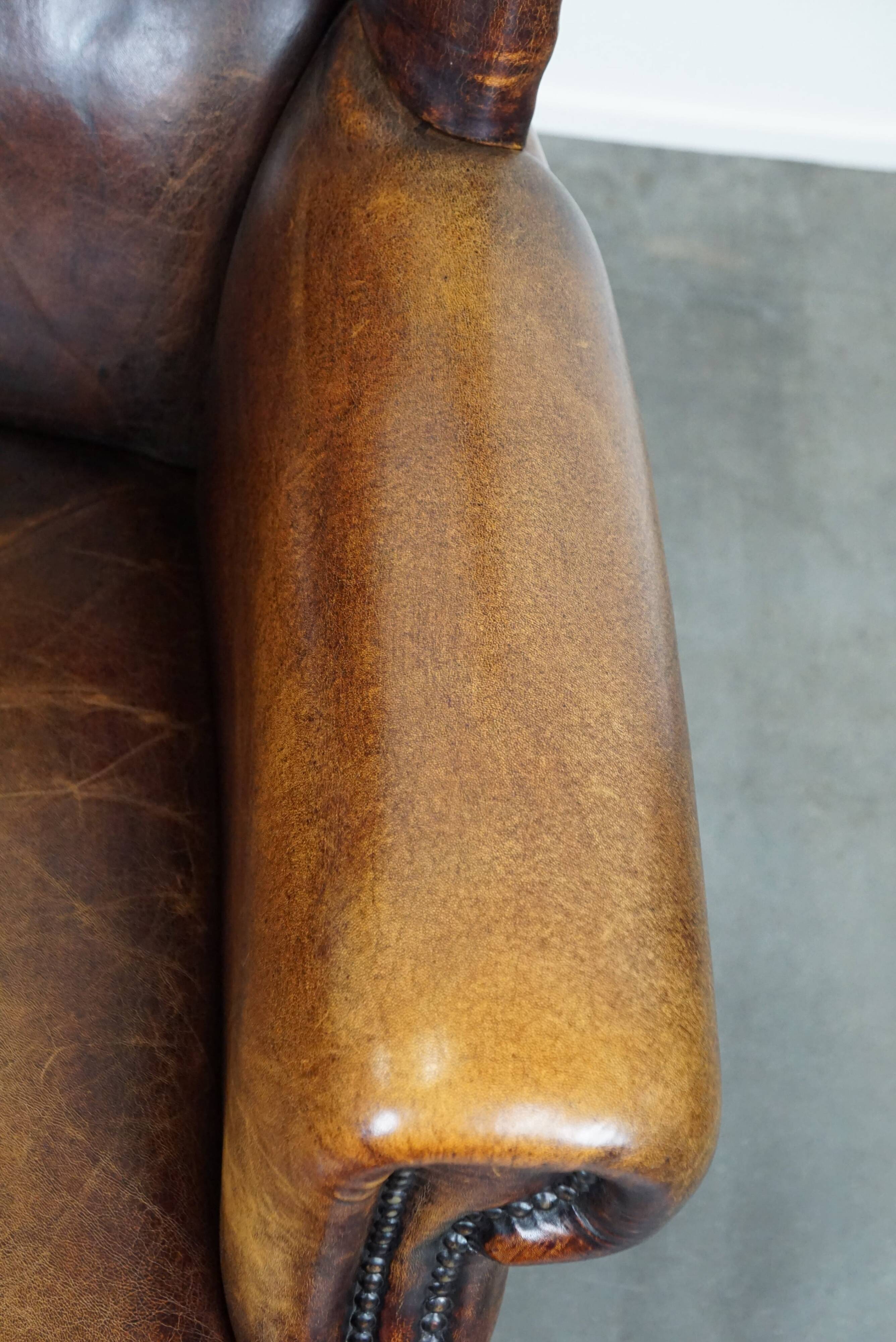 large wingback chair made of sheepskin leather with uniquely beautiful colors