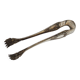 Antique metal sugar tongs in the shape of a lion's paw.