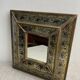 Eglomisé mirror with wooden parecloses